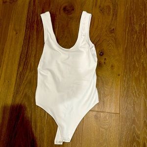 Nuuds white body suit